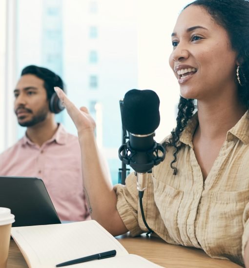 Man, woman and radio with interview, live streaming and talk show with happiness, public relations